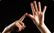 Hands signing in British Sign Language